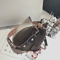Shop female bag 2017 new fashion bucket bag portable shoulder strap rivet Xiekua package female foreign tide Coffee