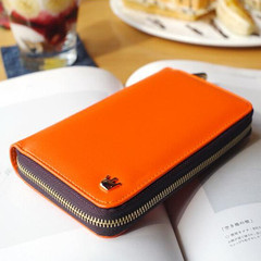 A new woman's long zipper wallet, a large wallet card bag, a mobile phone bag, a hand bag and a purse Orange long