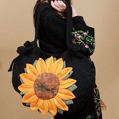 Yunnan new handmade cloth bag portable Shoulder Bag Handbag embroidery embroidery canvas hobo sunflower Black background yellow flower
