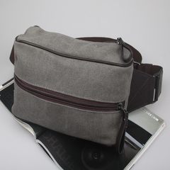 Trend of Korean men's canvas SATCHEL BAG BAG chest leisure Xiekua package outdoor sports bag luggage ride (a black canvas)