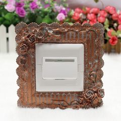 The room is decorated with acrylic garden switch affixed with european-style creative socket wall affixed with resin closed fire switch cover Korean K052
