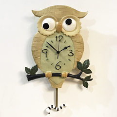 The bedroom living room wall clock clock clock super mute children watch modern creative personality garden wall clock Owl 14 inches The owl clock
