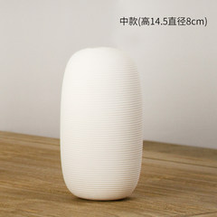 White ceramic flower vase ornaments modern minimalist living flower inserting device creative table centerpiece. Middle paragraph (14.5 8cm in diameter)