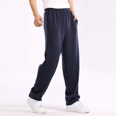 Sports pants in autumn and winter plus cashmere men's trousers, loose straight cylinder casual pants, four cotton thin, add fat XL Cashmere XXL160-200 Jin Dark blue (solid color)