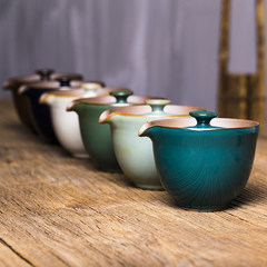 The hand is a ceramic teapot covered Sancai cup Kung Fu tea set tea tea pot filter accessories Blue glaze hand pot