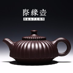 A famous teapot made in Yixing and a collection of ancient handmade purple clay pots, a collection of old purple clay pots, a pot teapot and a tea set