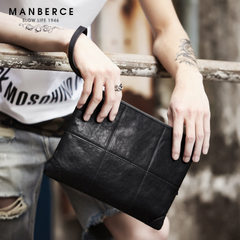 The new man in the manbers envelope with a leather black 
